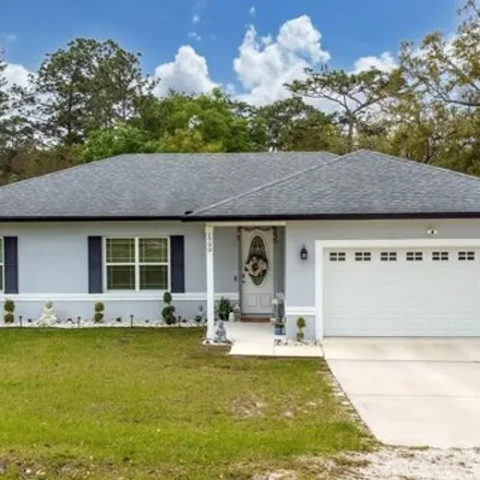 Buy this 3 bed house on 1790 12th Street in Orange City, DeLand