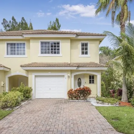 Rent this 3 bed townhouse on 944 Imperial Lake Road in Lake Belvedere Estates, Palm Beach County