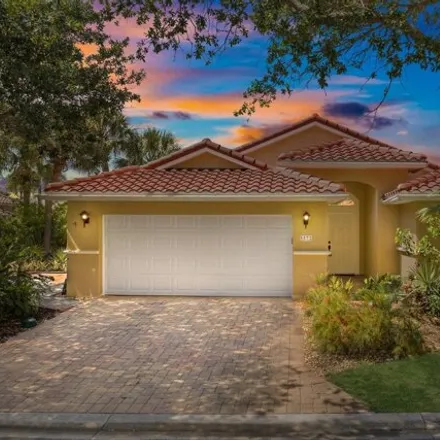 Rent this 3 bed house on 5572 Cord Grass Ln in Melbourne Beach, Florida