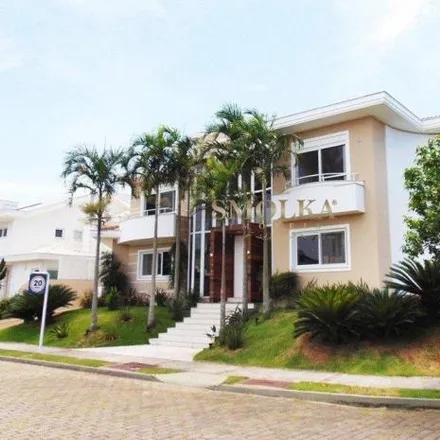 Rent this 4 bed house on Rua dos Robaletes in Jurerê Internacional, Florianópolis - SC