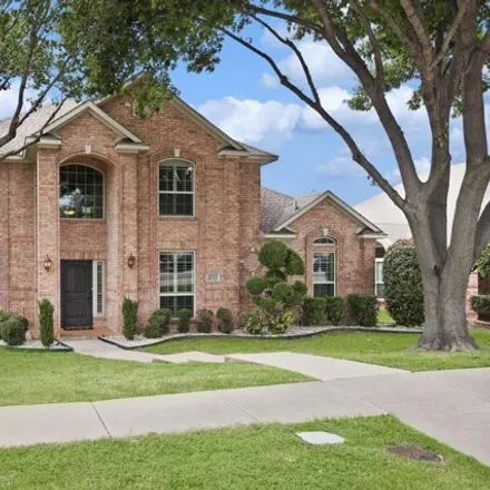 Buy this 4 bed house on 2024 Arbor Creek Drive in Carrollton, TX 75010