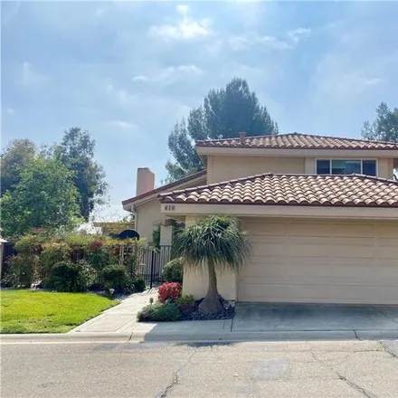 Rent this 4 bed house on 606 Augusta Court in Fullerton, CA 92835