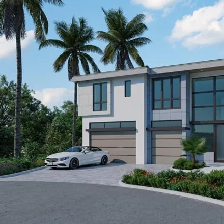Buy this 5 bed house on 700 Ne 29th Pl in Boca Raton, Florida