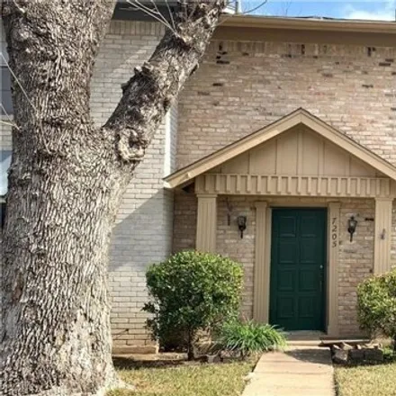 Rent this 3 bed house on 7203 Creekside Drive in Austin, TX 78752