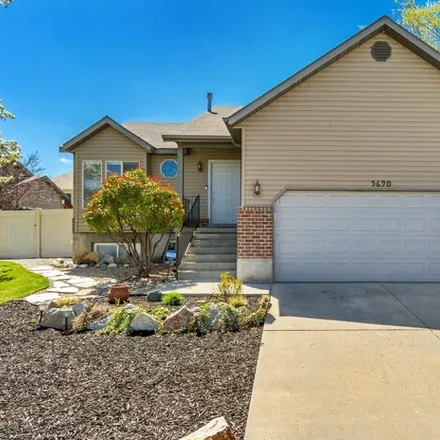 Buy this 4 bed house on 5684 Impressions Drive in Kearns, UT 84118