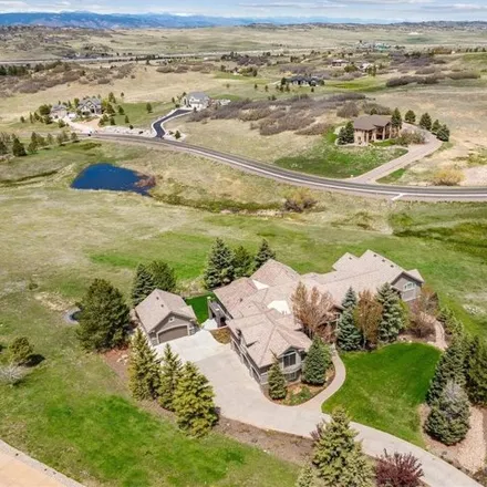 Buy this 7 bed house on 4165 Bell Mountain Drive in Douglas County, CO 80104