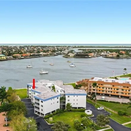 Buy this 2 bed condo on 610 West Elkcam Circle in Marco Island, FL 34145
