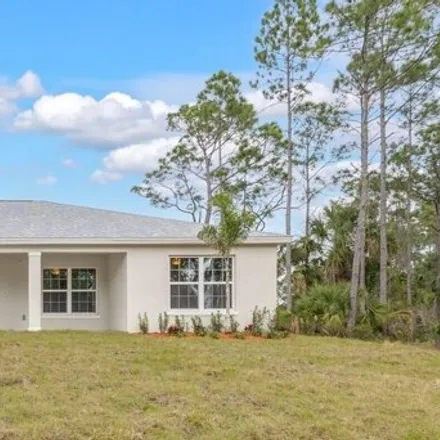 Buy this 4 bed house on 567 Fellenz Street in Palm Bay, FL 32908