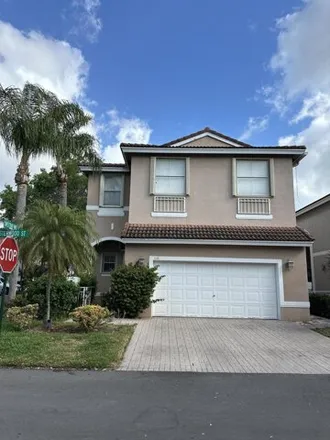 Rent this 4 bed house on 1199 Oysterwood Street in Hollywood, FL 33019