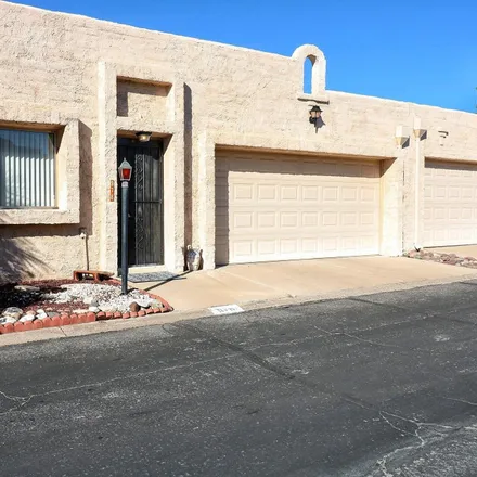 Buy this 2 bed townhouse on 978 West Beauchamp Lane in Pima County, AZ 85704