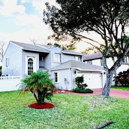 Rent this 4 bed house on 10758 Palm Spring Drive in Palm Beach County, FL 33428