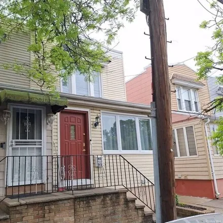 Buy this 3 bed house on 62-33 59th Dr in Maspeth, New York