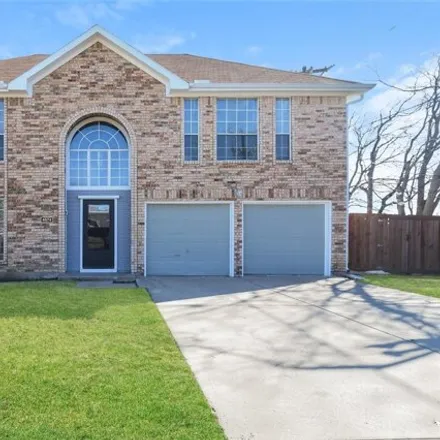 Rent this 4 bed house on 3668 Kingswood Boulevard in Grand Prairie, TX 75052
