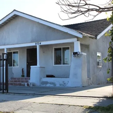 Buy this 7 bed house on 1708 East 97th Street in Los Angeles, CA 90002