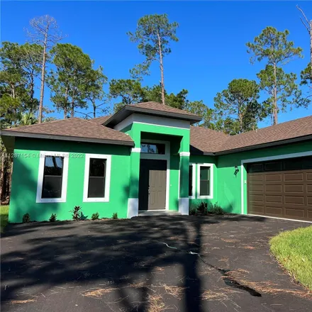 Rent this 4 bed house on 439 2nd Street Southeast in Collier County, FL 34117