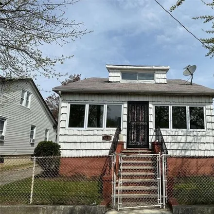 Buy this 3 bed house on 153-23 123rd Avenue in New York, NY 11434