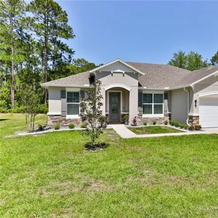 Buy this 3 bed house on 86 Ryan Drive in Palm Coast, FL 32164