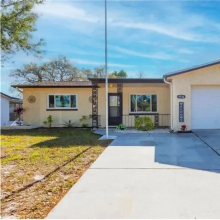 Rent this 2 bed house on 9738 Rainelle Ln in Port Richey, Florida