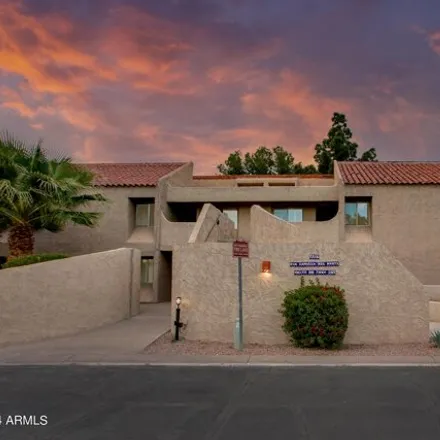 Rent this 3 bed apartment on 7316 N Via Camello Del Norte Unit 103 in Scottsdale, Arizona