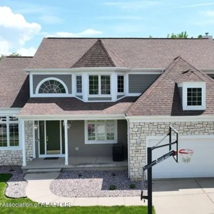 Buy this 4 bed house on 5566 Star Flower Drive in Haslett, MI 48840
