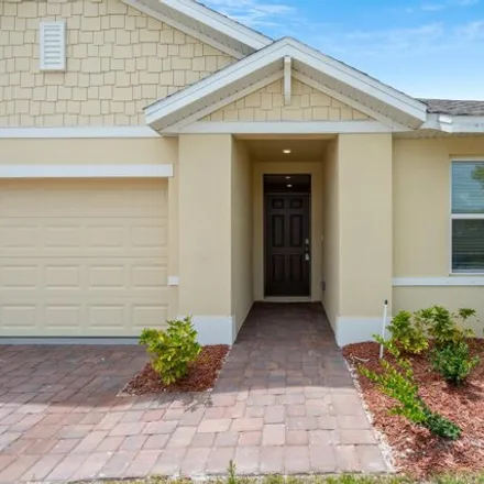 Rent this 3 bed house on Dugan Circle Southeast in Palm Bay, FL