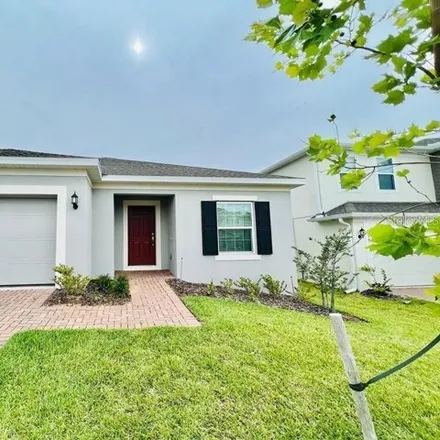 Rent this 4 bed house on 682 Blackstone St in Minneola, Florida