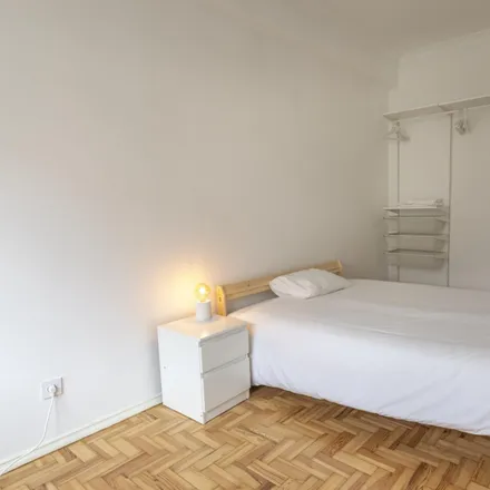Rent this 5 bed room on Rua da Beneficência 141 in 1600-021 Lisbon, Portugal