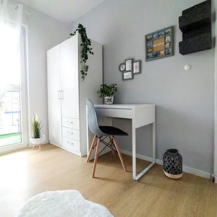 Rent this 5 bed apartment on Aleja Kijowska 35 in 30-079 Krakow, Poland