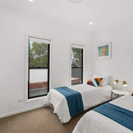 Rent this 3 bed townhouse on Booker Bay NSW 2257