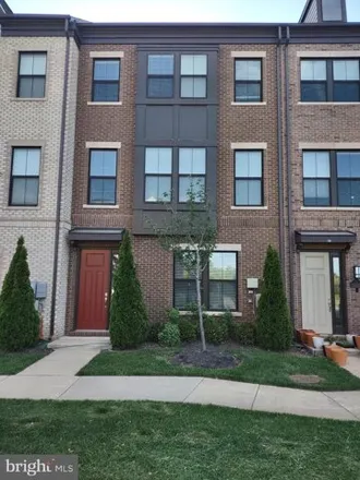 Rent this 3 bed townhouse on Air & Space Museum Parkway in Sully Square, Fairfax County