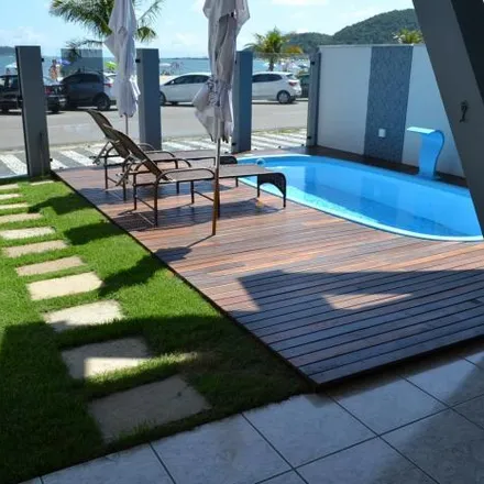 Rent this 4 bed house on Studio Vida Ativa in Avenida Atlântica 534, Enseada