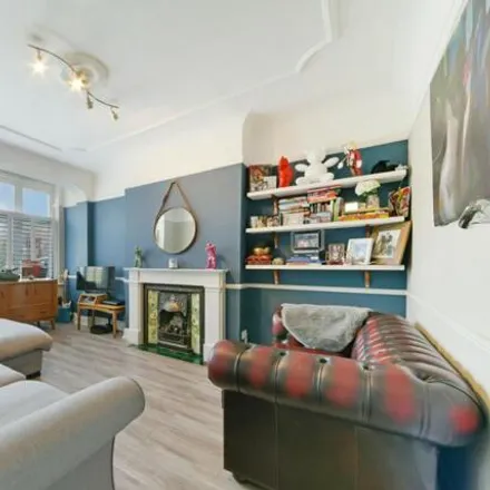 Rent this 3 bed townhouse on 38 Lower Downs Road in London, SW20 8QQ