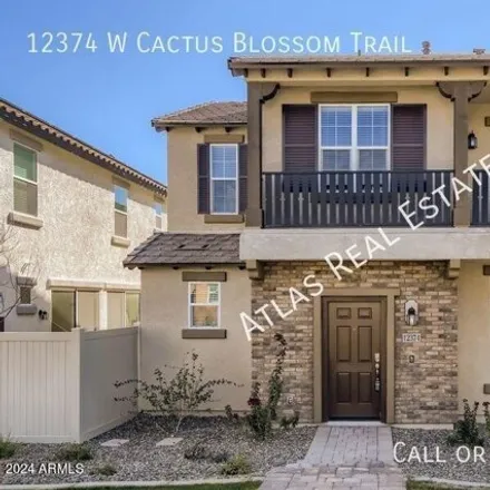 Rent this 3 bed house on West Cactus Blossom Trail in Peoria, AZ