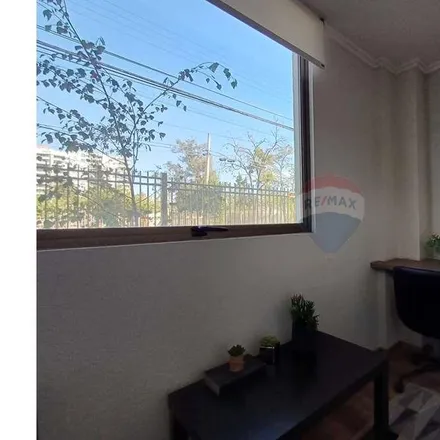 Buy this 4 bed townhouse on Cuarta Avenida 1364 in 892 0241 San Miguel, Chile