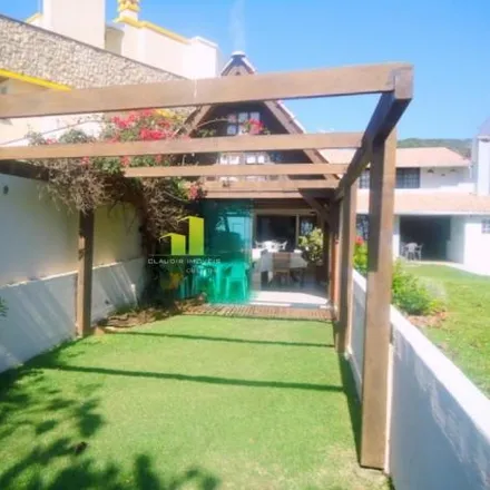 Rent this 4 bed house on Rua Ariramba in Bombas, Bombinhas - SC