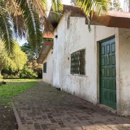 Buy this 3 bed house on Martín Fierro in Las Golondrinas, Buenos Aires