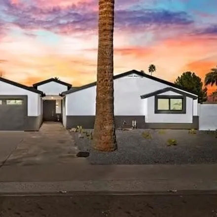 Buy this 4 bed house on 8346 East Roma Avenue in Scottsdale, AZ 85251