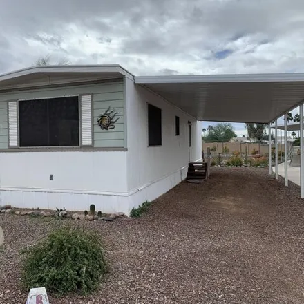 Buy this studio apartment on 128 South 95th Street in Maricopa County, AZ 85208