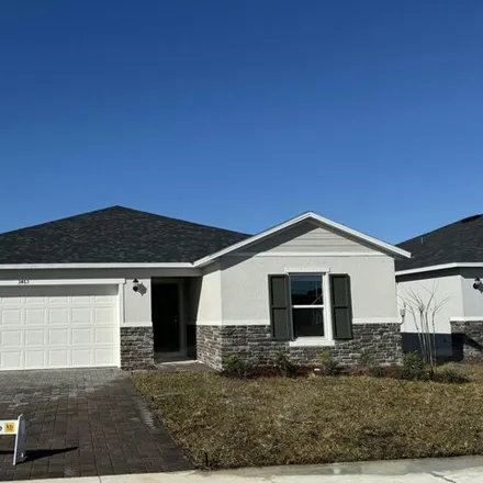Rent this 3 bed house on Grappler Circle Southeast in Palm Bay, FL