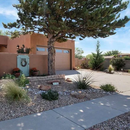 Buy this 3 bed townhouse on 7016 Leslynne Drive Northeast in Albuquerque, NM 87109