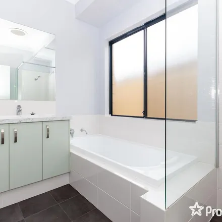 Rent this 3 bed apartment on Verdant Crescent in Seville Grove WA 6112, Australia