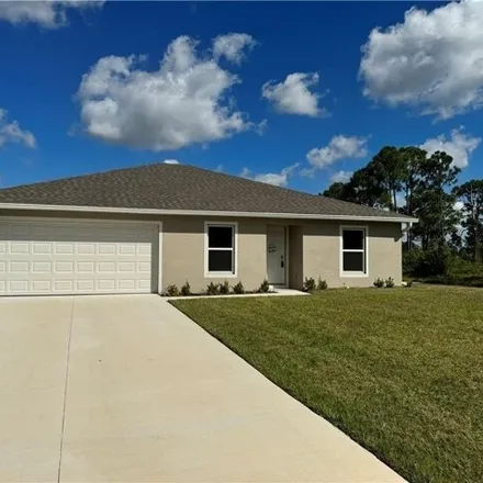 Buy this 3 bed house on Yukon Road in Lehigh Acres, FL
