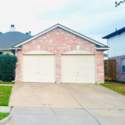 Rent this 4 bed house on 7647 Southbridge Lane in Arlington, TX 76002