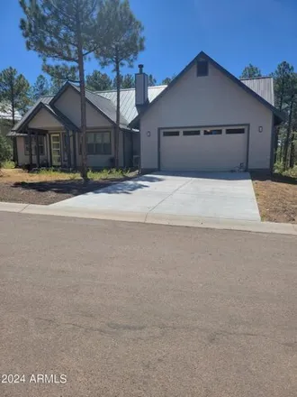 Buy this 3 bed house on 1042 South Redberry Drive in Show Low, AZ 85901