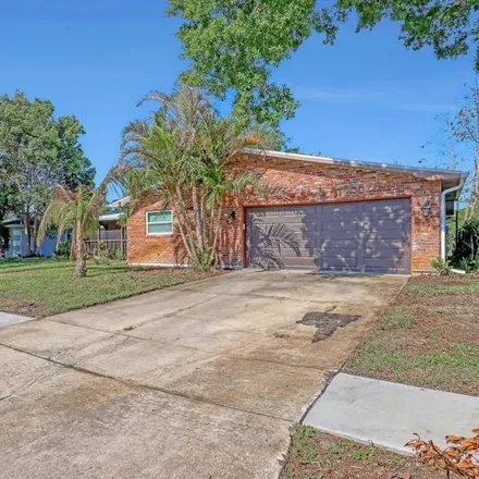Buy this 4 bed house on 1732 Robin Hood Ave in Titusville, Florida