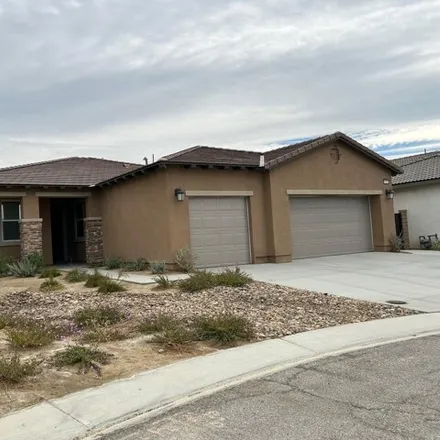 Rent this 4 bed house on 40071 Catania Court in Indio, CA 92203