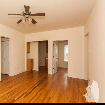 Rent this 2 bed apartment on 3912 North Pine Grove Avenue