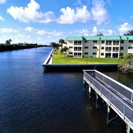 Rent this 2 bed apartment on 49 Colonial Club Drive in Boynton Beach, FL 33435