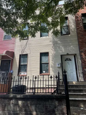 Buy this 5 bed townhouse on 100 Sackman Street in New York, NY 11233