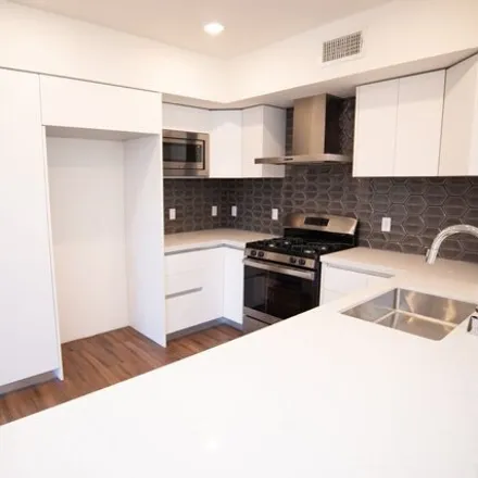 Rent this 4 bed condo on Hara Sushi in Wellesley Avenue, Los Angeles